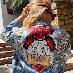 手描きデニムジャケット | Veste Peinte à la Main | ポップアートジャケット | レディースカスタムジーンズジャケット | ダックテイルズアート | 手描きの衣類