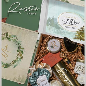 May include: A gift box containing a gold tumbler, a compact mirror with the letter R, heart-shaped sunglasses, a brown notebook, a bottle stopper, a candle labeled You're So Fire, a bath bomb, and two scrunchies. The box lid features a floral wreath.