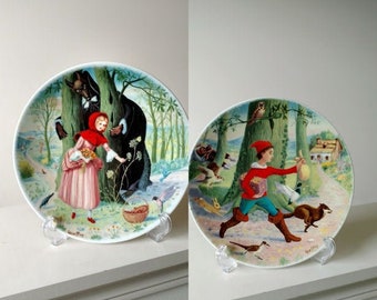 1984, Limoges Turgot Le Pet it Poucet (Tom Thumb) Le Petit Chaperon Rouge (Little Red Riding Hood) by Andre Quellier 8.5" Porcelain  Plates