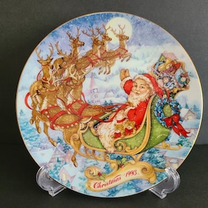 Kerstbord 1993, speciale kerstlevering porselein afgezet met 22 kt goud van AVON