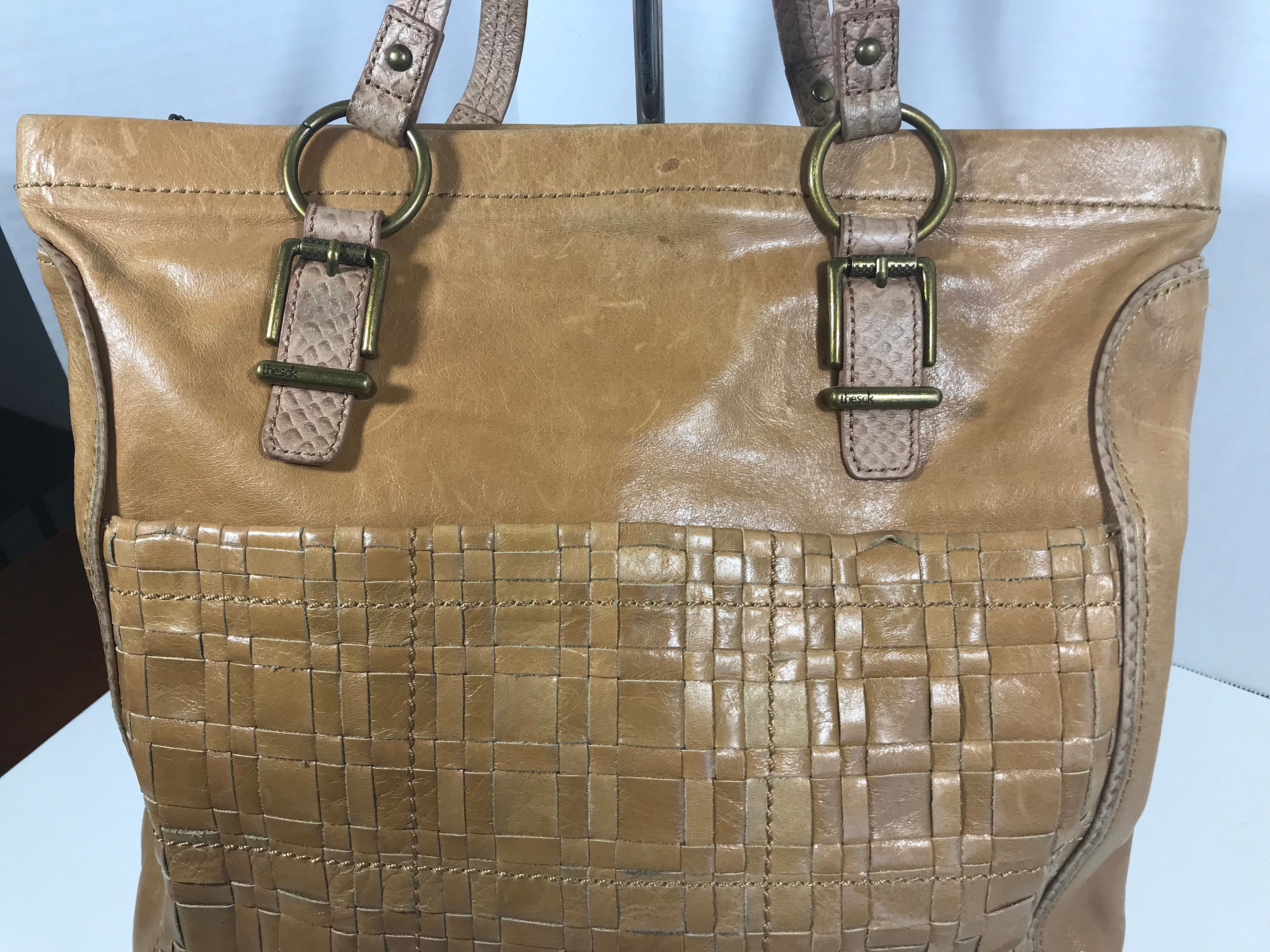 The Sak leather tote The Sak distressed brown leather large travel bag The Sak large leather purse with front woven leather detail