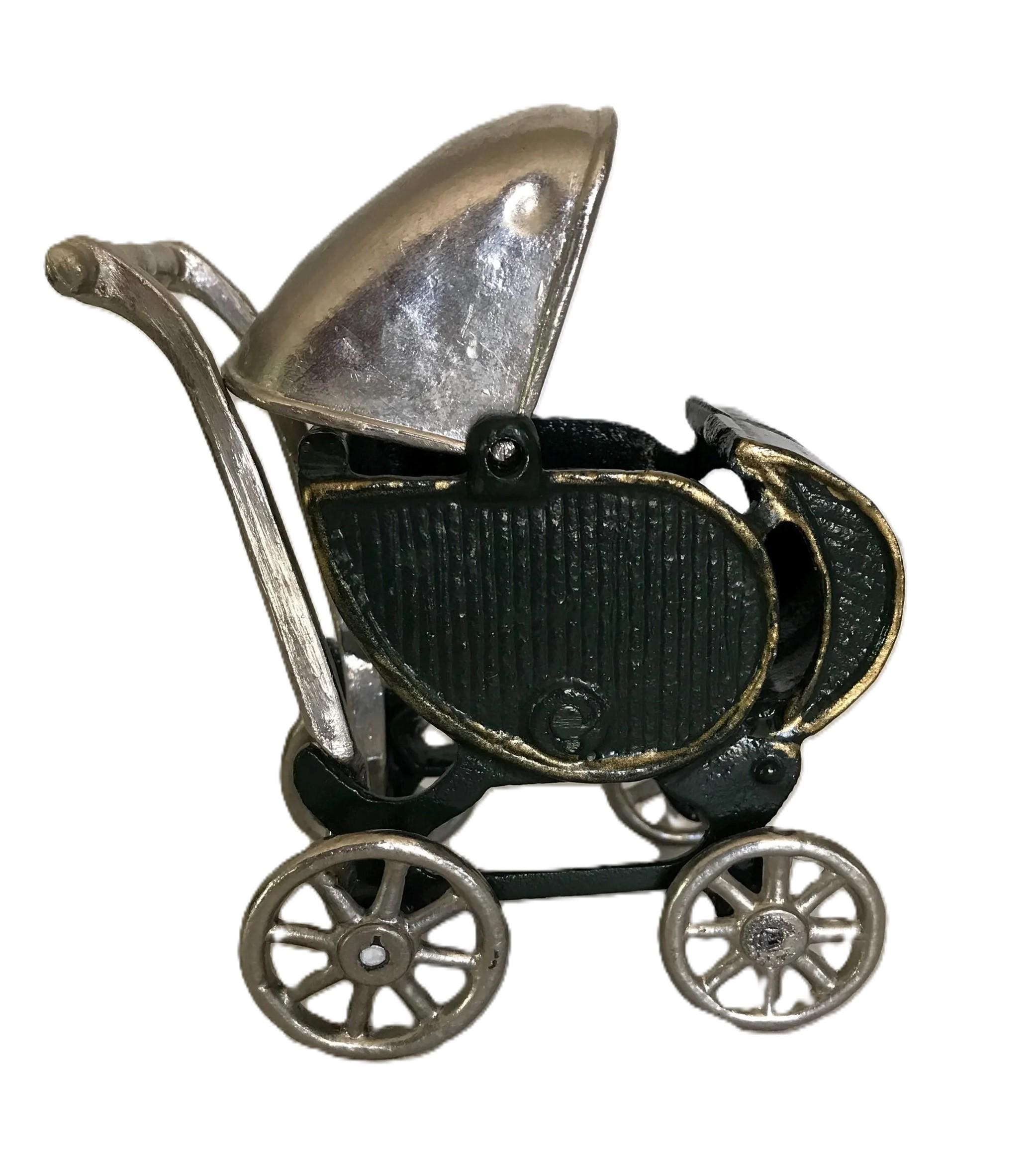 Vintage kleine Kinderwagen aus Gusseisen, Vintage Kinderwagen aus  Gusseisen, antiker Kinderwagen aus Gusseisen mit beweglicher oberer  Abdeckung. - Etsy.de