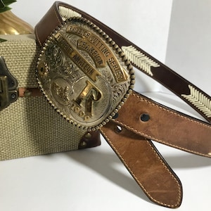 Vintage Gist Sterling overlay 1999 champion belt buckle and leather belt, Gist Sterling trophy belt buckle Raleigh Cutting Series Champion