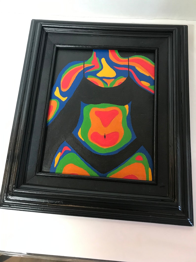 May include: A framed painting of a person's torso with a black background and colorful, abstract, swirling patterns in shades of red, orange, yellow, green, and blue.