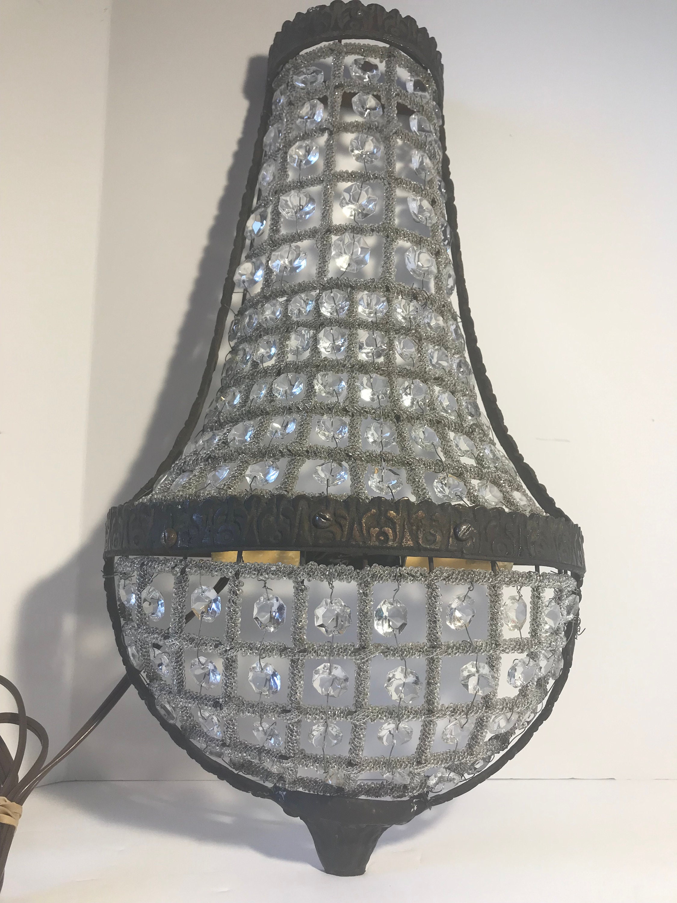 Beaded wall sconce outlet