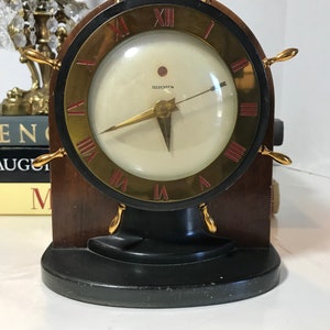 Vintage 1940s Telechron electric clock, Vintage 1940s Warren Telechron Co ship wheel brass and wood mantle clock, Vintage 40s mantel clock