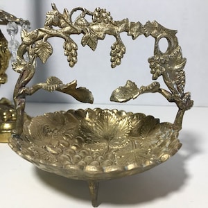 Vintage ornate small brass bowl with handle, elegant brass embossed grape and leaf design footed basket, Vintage brass trinket dish