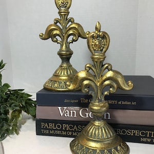 Vintage cast iron bookends, vintage gold painted cast iron bookends, Unique cast iron finial style bookends, Victorian style bookends.