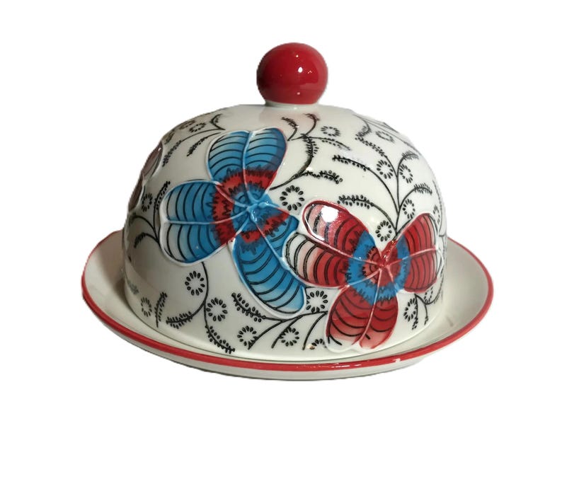 Anthropologie style Coastline Imports unique round butter dish, Ceramic black white with red and blue floral design cheese plate with cloche image 1
