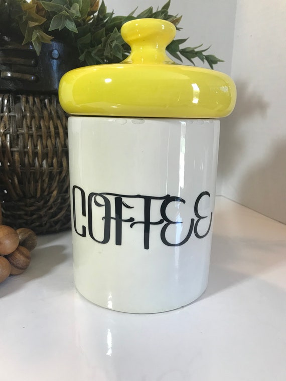 ヴィンテージの陶器製コーヒーキャニスター、明るい黄色の蓋が付いた