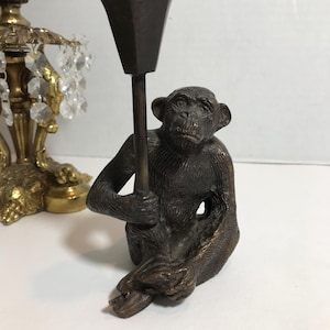 Vintage bronze monkey candle holder, Vintage cast bronze metal monkey holding candleholder, Vintage bronze monkey statue, monkey decor