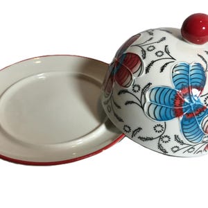 Anthropologie style Coastline Imports unique round butter dish, Ceramic black white with red and blue floral design cheese plate with cloche image 2
