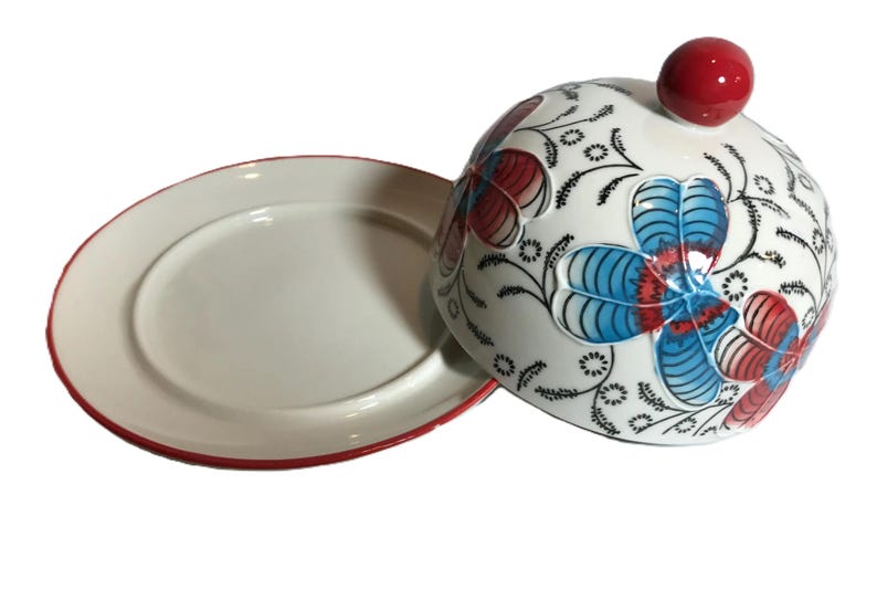 Anthropologie style Coastline Imports unique round butter dish, Ceramic black white with red and blue floral design cheese plate with cloche image 2