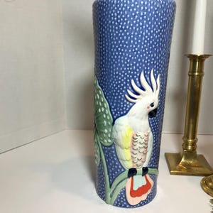 Large blue textured ceramic bird vase, Large vibrant cockatoo vase, ceramic raised polka dot vase with leaves and bird, whimsical bird vase