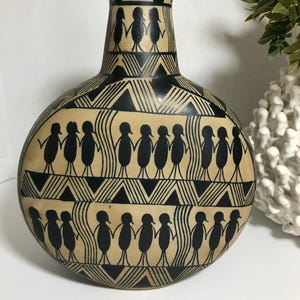 Unique hand painted folk art style vase, matte finish bold pattern vase, black and tan painted people design pottery vase, ceramic boho vase