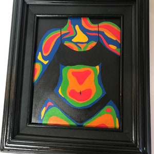 May include: A framed painting of a person's torso with a black tank top. The painting is done in a colorful abstract style with swirling lines and shapes in shades of red, orange, yellow, green, blue, and purple.