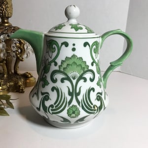 Vintage green and white floral design Teapot, Vintage World Market Majolica style green and white floral and bird design teapot pitcher
