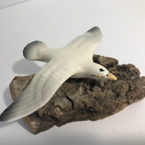 Vintage porcelain moving seagull figurine hovered over wooden rock, Vintage beach decor seagull over rock, vintage seaside ocean decor