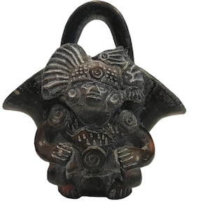 Antique hand-formed effigy vessel, small black clay warrior-style pitcher, primitive art pottery figure urn