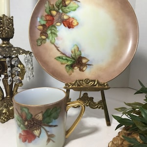 Vintage hand painted ceramic plate and coordinating cup, signed, Vintage painted floral porcelain cabinet plate and matching cup, signed
