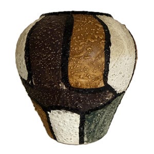 May include: A textured, spherical vase with a patchwork design. The vase features sections of white, brown, tan, and green, outlined in black. The surface has a bumpy, speckled appearance, adding to its unique aesthetic.