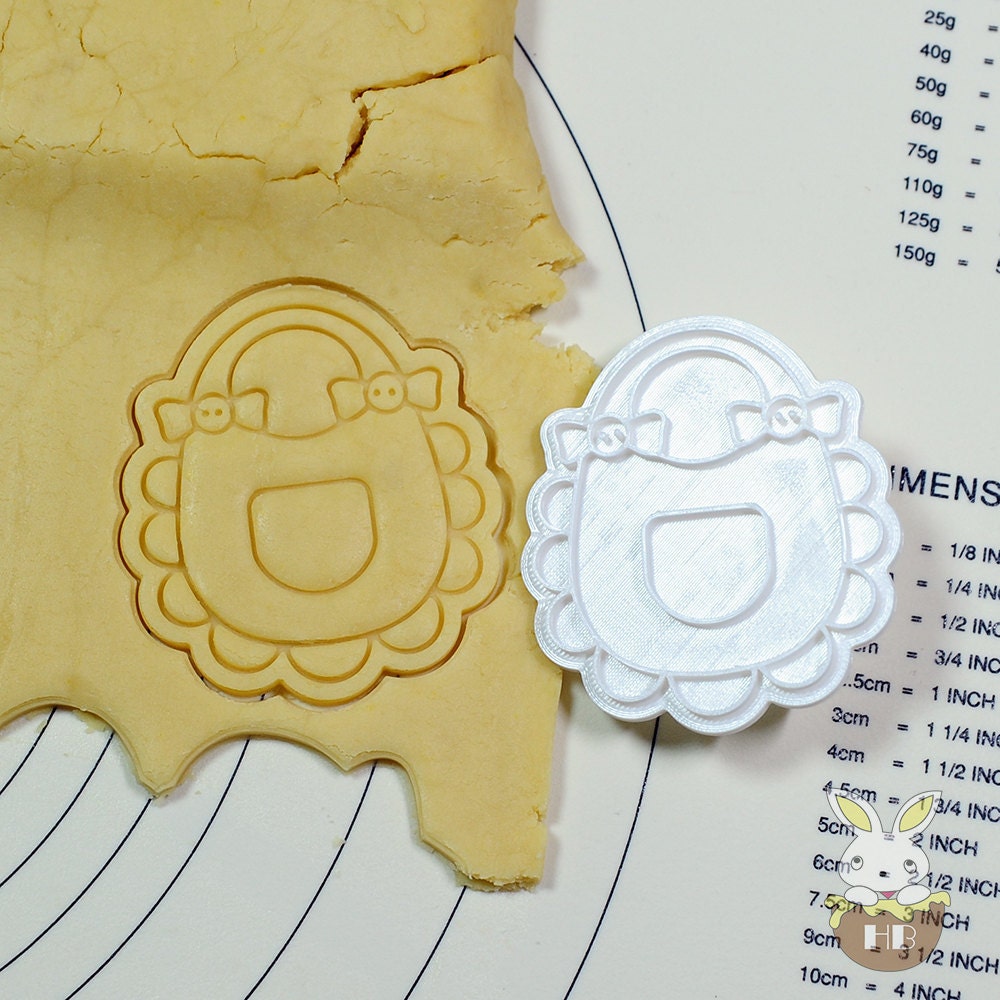 Bib with Pocket Cookie Cutter and Stamp Set