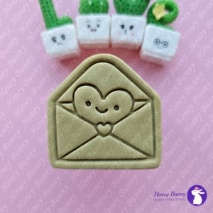 Molde para galletas con forma de corazón y sonrisa