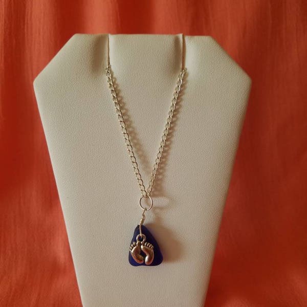 Great Lakes beach glass necklace using a very rare cobalt blue piece and silvertone bare feet.