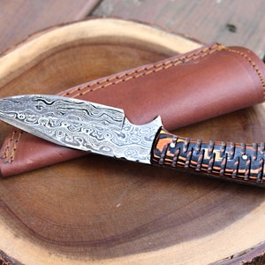 Damascus steel fixed style knife by titan