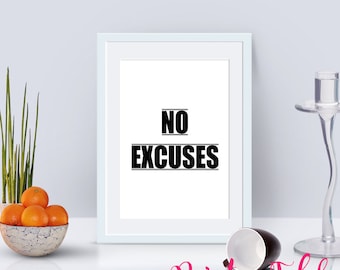 May include: White framed print with the text "NO EXCUSES" in black bold letters. The print is on a white background and is sitting on a white surface.