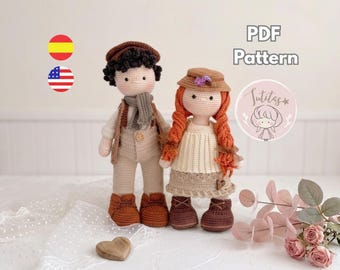 May include: Two handmade crochet dolls featuring a boy with dark curly hair, a brown cap, a grey scarf, and beige overalls, and a girl with long orange braided hair, a brown hat, and a cream-colored dress. The image includes the text PDF Pattern.