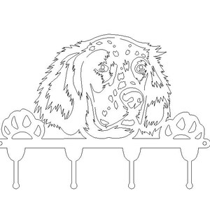 May include: A black and white line art illustration of a dog's head peeking over a coat rack with three hooks. The coat rack is shaped like a paw print.