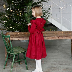 Girls Red Linen Christmas Dress With Buttons And Ribbon, Festive Linen Dress With Long Sleeves, Long Sleeve Linen Christmas Photoshoot Dress image 3