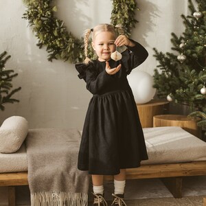 Black linen christmas dress with ribbon.