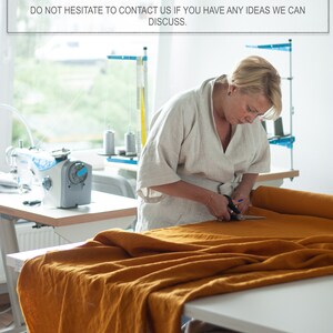 May include: A woman cuts a large piece of mustard yellow fabric with scissors. The fabric is laid out on a table in a workshop setting. The text above reads: "WE GLADLY ACCEPT CUSTOM ORDERS FOR ANY SIZE OR DESIGN AND MORE THAN 40 COLORS. DO NOT HESITATE TO CONTACT US IF YOU HAVE ANY IDEAS WE CAN DISCUSS."