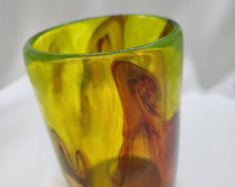 Brown and yellow swirly hand-blown glass tumbler
