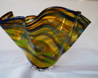 8 - Unique hand-blown ruffled floppy bowl light blue, yellow, and brown swirl pattern with clear foot and dark lip