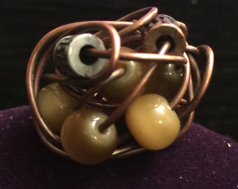 Interwoven beaded ring