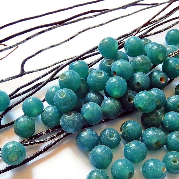 Perles indiennes 7 mm verre turquoise foncé lagon par 10