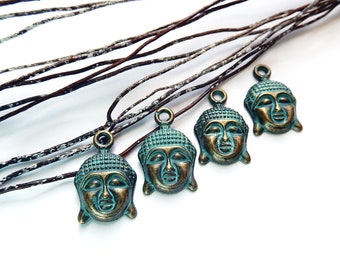 2 Pendentifs tête de Bouddha 22 mm métal bronze patine turquoise breloques