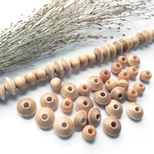 50 light natural wooden beads 6/9 mm