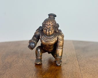 Krishna gateando / Krishna bola de mantequilla - Prasiddh Idols presenta una réplica de un ídolo de cobre del museo