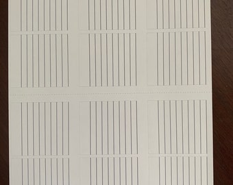 May include: A white sheet of paper with six sections, each containing 12 horizontal lines. The paper is labeled "deliberate doodles" in the top left corner.