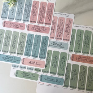 May include: A set of colorful printable stickers with scripture verses from the Book of Mormon. Each sticker features a different verse and a corresponding month of the year. The stickers are designed to help people follow along with the Come Follow Me program.