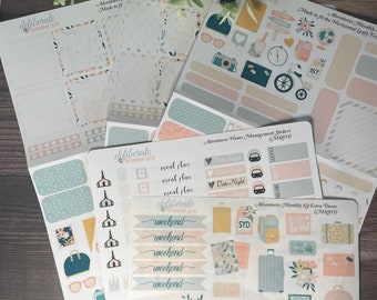 May include: A set of colourful stickers featuring travel-themed illustrations, including suitcases, aeroplanes, cameras, and floral designs. The stickers are designed for use in planners, journals, and other paper crafts. The stickers are labelled "Adventures Monthly Kit Extra Decor (MK055)" and "Adventures Home Management Stickers (MK055)".
