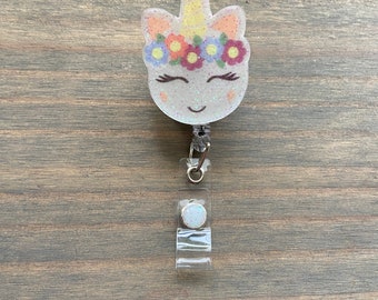 Carrete de insignia de unicornio