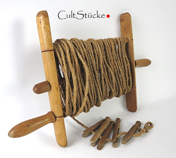 Vintage años 50 husillo de ropa dispensador de madera tendedero