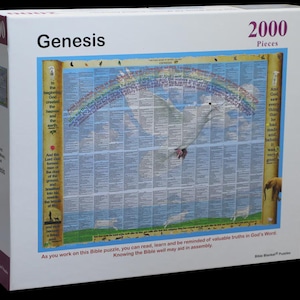 Könnte beinhalten: Eine weiße Schachtel mit einem 2000-teiligen Puzzle mit dem Titel "Genesis". Das Puzzle-Bild zeigt einen bunten Regenbogen über einem blauen Hintergrund mit Text. Die Schachtel trägt den Text "As you work on this Bible puzzle, you can read, learn and be reminded of valuable truths in God's Word."