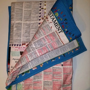 Bible Blanket. Entire Bible on beautifully decorated queen size quilt. Scripture quilt made with 400 thread count Egyptian cotton fabric.