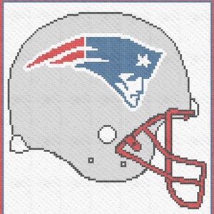 May include: A white and blue football helmet with a red and blue logo. The logo is a stylised 'Patriots' logo with a star.